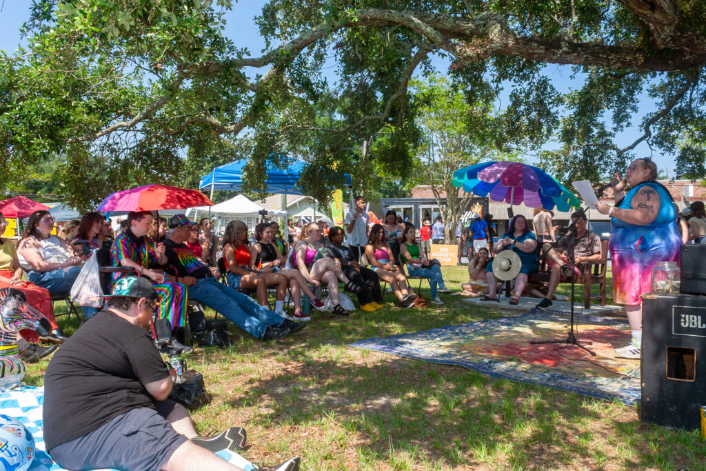 Crowd watching a performer at PensaPride